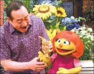  ?? ZACH HYMAN / ASSOCIATED PRESS ?? Julia, a new autistic Muppet character, debuts on the 47th season of Sesame Street on both PBS and HBO on April 10.