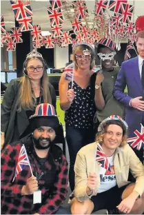  ??  ?? ●●Staff at LSH Auto celebrate the Royal wedding