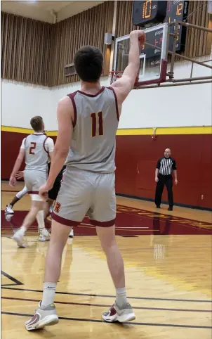  ?? JAKE MATSON — THE TIMES-STANDARD ?? Redwoods freshman Kai Purcell hits a 3-point shot during the 76-60 win over Marin. The Arcata native had 13points for the Corsairs in the victory.