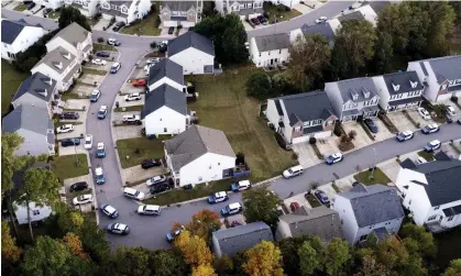  ?? Photograph: Travis Long/AP ?? In this aerial image taken with a drone, law enforcemen­t officers work at the scene of a shooting in Raleigh, North Carolina, on Thursday.
