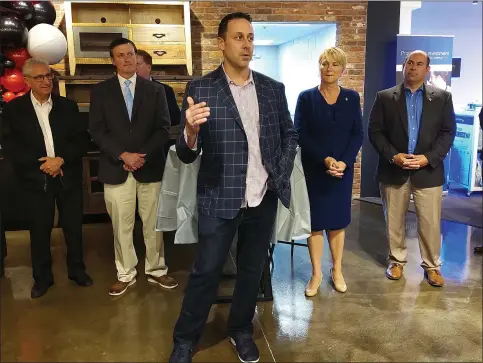  ?? MELISSA SCHUMAN - MEDIANEWS GROUP ?? Mike Fiacco, owner of Old Brick Furniture Co., speaks at the ribbon cutting.