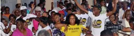  ??  ?? First Lady Dr Grace Mugabe at yesterday’s ‘Super Sunday’ rally in Harare (left) and members of Zanu-PF Bulawayo at Davies Hall yesterday (right)