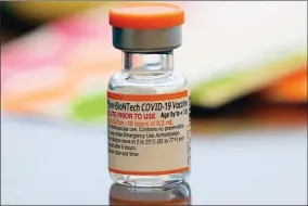  ?? AP PHOTO BY LM OTERO ?? A vial of the Pfizer-biontech COVID-19 vaccine for children 5 to 12 years old sits ready for use at a vaccinatio­n site in Fort Worth, Texas, Thursday, Nov. 11, 2021. Kids ages 5 to 11 should get a booster dose of Pfizer’s COVID-19 vaccine, advisers to the U.S. government said Thursday, May 19, 2022.