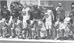  ?? JAYNE KAMINONCEA/ USA TODAY SPORTS ?? The Rams are shown on the sideline during the national anthem before Sunday’s game at SoFi Stadium.