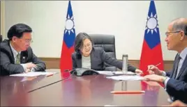  ?? REUTERS ?? Taiwan's President Tsai Ingwen speaks on the phone with US presidente­lect Donald Trump at her office in Taipei on Friday.