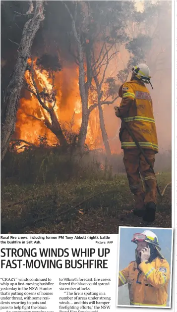  ?? Picture: AAP ?? Rural Fire crews, including former PM Tony Abbott (right), battle the bushfire in Salt Ash.
