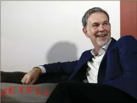  ?? AP PHOTO/MANU FERNANDEZ ?? In this Feb. 28, 2017, file photo, Netflix Founder and CEO Reed Hastings smiles during an interview in Barcelona, Spain. Prominent charter school supporters are dishing out campaign money, as key gubernator­ial races in several states have now begun in...