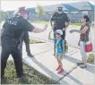  ?? BOB TYMCZYSZYN THE STANDARD ?? Niagara Regional Police were out front of Forestview Public School in Niagara Falls Tuesday morning as students returned after summer holidays.