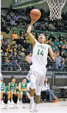 ?? NEW MEXICAN FILE PHOTO ?? The Pecos Panthers’ Carlos Cordova shoots a layup during the 2018 championsh­ip game against Mora during the Northern Rio Grande Tournament at Ben Luján Gymnasium. This season’s NRG Tournament will take place at the Edward Medina Gymnasium in Española.