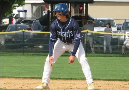  ?? ED MORLOCK/MEDIANEWS GROUP ?? North Penn’s Justin Egner takes a lead off first base after hitting an RBI single in the first inning against Central Bucks West.