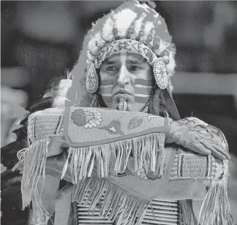 ?? | SETH PERLMANAP ?? Chief Illiniwek performs for the last time in Champaign on Feb. 21, 2007.