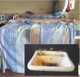  ??  ?? Soiled linen on the bed used by a previous patient that will be used by the next patient at Odzi Clinic. Inset: A filthy wash basin at Odzi Clinic. —Pictures: Dorcas Mhungu