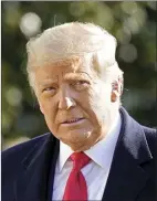  ?? AP file photo ?? Questioned for a lawsuit, former President Donald Trump hurled insults and threatened to sue the columnist who accused him of raping her in a department store in the 1990s, according to excerpts of his testimony unsealed by a court on Friday. This photo was taken Jan. 12, 2021.