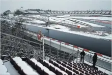  ?? MANU FERNANDEZ THE ASSOCIATED PRESS ?? The Catalunya racetrack with snow covered seating before F1 testing Wednesday.