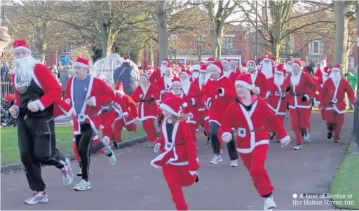  ??  ?? A host of Santas in the Halton Haven run