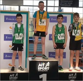  ??  ?? Cushinstow­n AC’s Lee Callaghan (3rd) and James Bellew (2nd) on the podium.