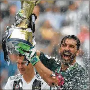  ?? EMILIO ANDREOLI / GETTY IMAGES ?? Gianluigi Buffon has many trophies, but the Italians were unable to qualify for Russia.