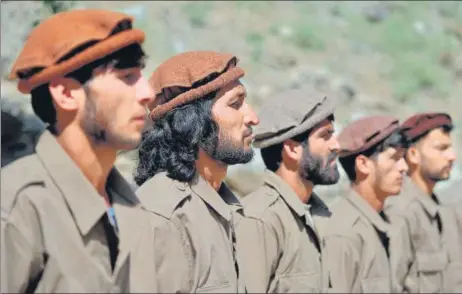  ?? AFP ?? Newly absorbed personnel of the Afghan security forces take part in a training session in Bandejoy area of Dara district in Panjshir province.