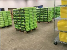  ?? JULIE CARR SMYTH — THE ASSOCIATED PRESS ?? Containers for secure ballot handling sit on pallets at the Franklin County Board of Elections in Columbus. The Supreme Court will soon hear a case about Ohio efforts to remove inactive voters from rolls, which has become a flashpoint in a nationwide...