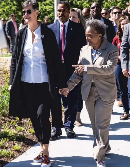  ?? ASHLEE REZIN/SUN-TIMES ?? First lady Amy Eshleman and Mayor Lori Lightfoot announced Chicago Title IX week is coming in July.