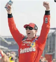  ?? MICHAEL CONROY/ASSOCIATED PRESS ?? Defending champ Kyle Busch celebrates after Sunday’s Brickyard 400, his 4th Sprint Cup victory of the year.