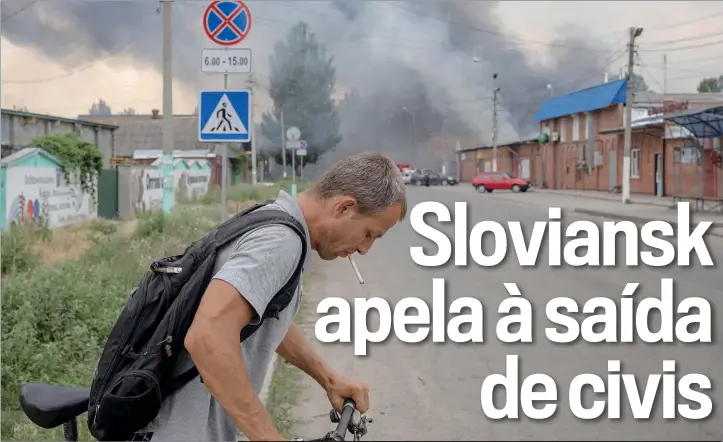  ?? ?? Forças russas intensific­aram nos últimos dias os bombardeam­entos contra a cidade de Sloviansk, em preparação para o lançamento de uma ofensiva terrestre para capturar toda a região de Donetsk