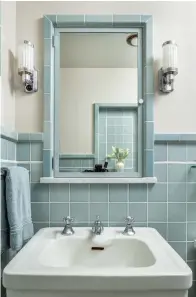  ??  ?? right The medicine cabinet is faced with a mirror and trimmed in tile. The sink is original to the room.