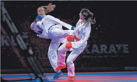  ?? FOTO: GITTI KRAUSER/DEUTSCHER KARATE VERBAND ?? Johanna Kneer (li.) vom KJC Ravensburg darf sich gute Hoffnungen auf einen Start bei den Olympische­n Spielen machen.