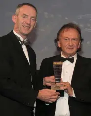  ??  ?? Sean Mulryan receives Property Entreprene­ur of the Year Award from Pinergy CEO Enda Gunnell