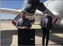  ?? NATALIE HANSON — ENTERPRISE-RECORD ?? Public Works Operation and Maintenanc­e Director Erik Gustafson, left, explains Wednesday in Chico how the funding and timeline for the taxiway is hoped to bring commercial air service back to the city as Rep. Doug LaMalfa (R-Richvale) looks on.