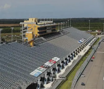  ?? Michael Reaves, Getty Images ?? The stands Homestead-miami Speedway were empty during Saturday’s Xfinity Series Hooters 250. On Sunday, 1,000 fans, almost entirely military members, will be cheering on the Cup Series race.