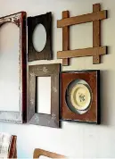  ??  ?? Old picture frames, collected over many years, hang in the dining area.