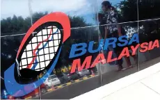  ?? — Bernama photo ?? Bursa Malaysia is expected to stay in consolidat­ion mode with a slight positive bias, and the benchmark index is seen as hovering in the 1,475 to 1,495 range.