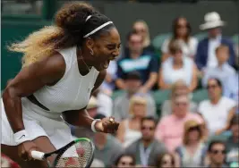  ?? ASSOCIATED PRESS ?? UNITED STATES’ SERENA WILLIAMS celebrates after winning a point against United States’ Alison Riske during a women’s quarterfin­al match on day eight of the Wimbledon Tennis Championsh­ips in London, Tuesday.