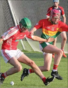  ??  ?? Willie Bolger of Ferns St. Aidan’s and Michael Dempsey (Rapparees) in a battle for the ball.