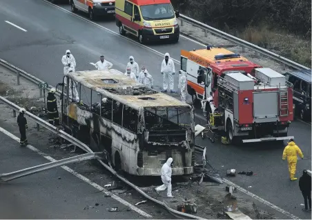 ?? AFP ?? Senior government officials from Bulgaria, Albania and North Macedonia visited the bus crash site west of Sofia