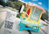  ?? ZUBI/COURTESY PHOTO ?? As the Florida heat takes its toll, the lifeguard shack sculpture in Miami has begun melting. The roof and railing are the first to have degraded.