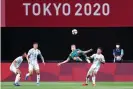  ?? Photograph: Masashi Hara/Getty Images ?? Australia’s Riley McGree tries to score with an overhead kick against Argentina.