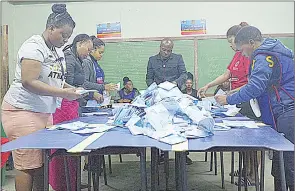  ?? (File pic) ?? Polling officers and clerks sorting out votes during the primary elections. This is not to suggest that these are the unpaid officers referred to in the story, but the picture has been used for demonstrat­ion purposes.