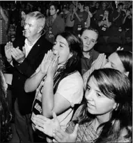  ?? GUARDIAN PHOT0 BY HEATHER TAWEEL ?? Rick Hillier stands amongst students as they cheer to the Strathcona Band version of Queen’s Bohemian Rhapsody. Hillier spoke to students as part of the Canadian Leadership Conference held in Montague.