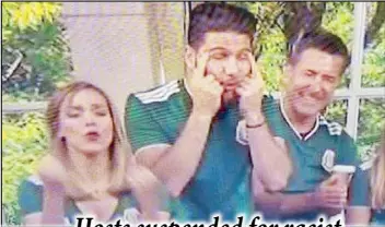  ??  ?? Photo courtesy of Telemundo shows James Tahhan (center) and Janice Bencosme, co-presenters of ‘Uno Nuevo Dia’ using their fingers to narrow their eyes during the on-set celebratio­n of South Korea’s 2-0 win over Germany.