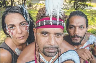  ?? Picture: BRIAN CASEY ?? COMMERCIAL TRIUMPH: Tjapukai dancers (from left) Tamara Pearson, Hamish Yeatman and Phillip Oui are helping show the world just how fascinatin­g Aboriginal culture is.