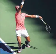  ?? AP ?? Rafael Nadal of Spain serves to Alexandr Dolgopolov of Ukraine during the fourth round of the US Open tennis tournament in New York yesterday.