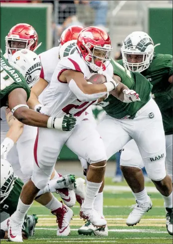  ?? NWA Democrat-Gazette/BEN GOFF • @NWABENGOFF ?? Arkansas running back Devwah Whaley carries the ball during the Hogs’ 34-27 loss to Colorado State on Sept. 8, 2018, at Canvas Stadium in Fort Collins, Colo.