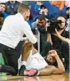  ?? CHUCKBURTO­N/AP ?? Miami forward Norchad Omier may miss the NCAA Tournament opener after suffering an ankle injury Friday.