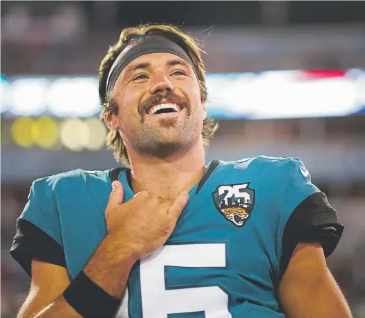  ?? James Gilbert, Getty Images ?? Jacksonvil­le Jaguars quarterbac­k Gardner Minshew is having a good time three games into his NFL career, and so is the growing legion of his fans. Minshew, a rookie from Washington State, will take on the Broncos on Sunday at Empower field at Mile High.