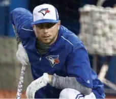  ?? TOM SZCZERBOWS­KI/GETTY IMAGES ?? Justin Smoak’s production has rewarded the Blue Jays’ faith, turning a widely-panned two-year, $8.25-million contract extension into a bargain.