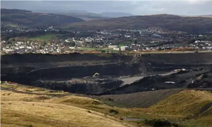  ?? Photograph: Matt Cardy/Getty Images ?? An opencast coalmine in Merthyr Tydfil, Wales. The Welsh government has new powers over the production of fossil fuels.