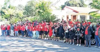  ?? ?? EFF members at the Gardee family residence in Mbombela, Mpumalanga, yesterday following the killing of Hillary Gardee, daughter of the party’s former secretary-general Godrich Gardee.