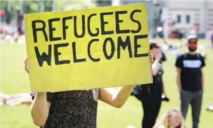  ??  ?? Activists protests in Amsterdam on Saturday. One third of Dutch municipali­ties have said they are in favour of bringing 500 children to the Netherland­s, according to the University of Utrecht. Photograph: Paulo Amorim/VW Pics/Zuma Wire/Rex/Shuttersto­ck